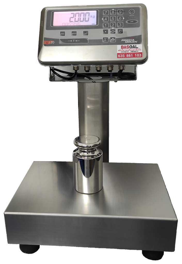 Báscula industrial iMN/FLQ i20 con plataforma y columna de acero inoxidable 316L. Presenta un indicador i20 de acero inoxidable 304L IP67 con pantalla LCD retroiluminada y teclado numérico completo. Funciones avanzadas como control de peso, cuentapiezas y control +/-, diseñada para entornos industriales exigentes.